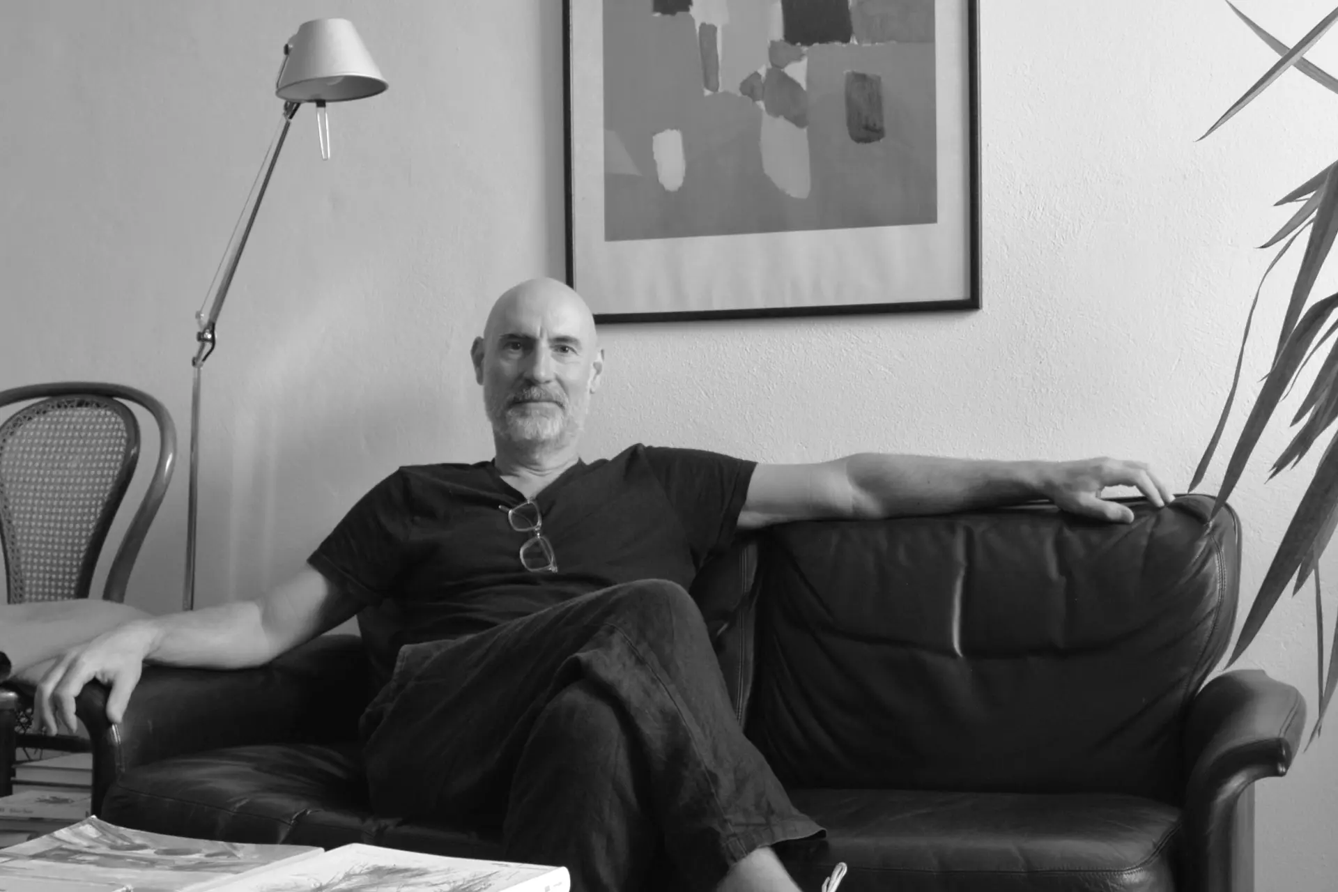 Stéphane Pingaud seated on a sofa